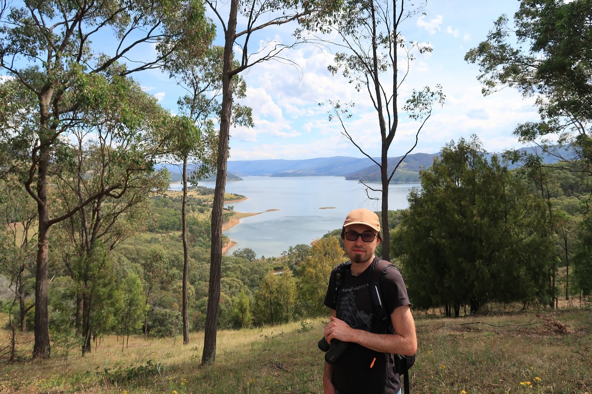 Martin Helmer overlooking a lake and landscape
